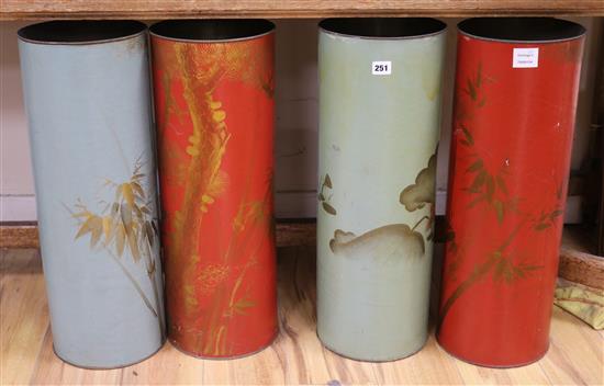 Four Chinese lacquered metal stick and umbrella stands